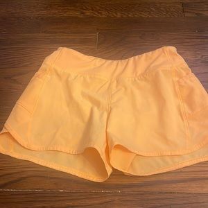Girls orange athleta shorts 8-10 perfect condition